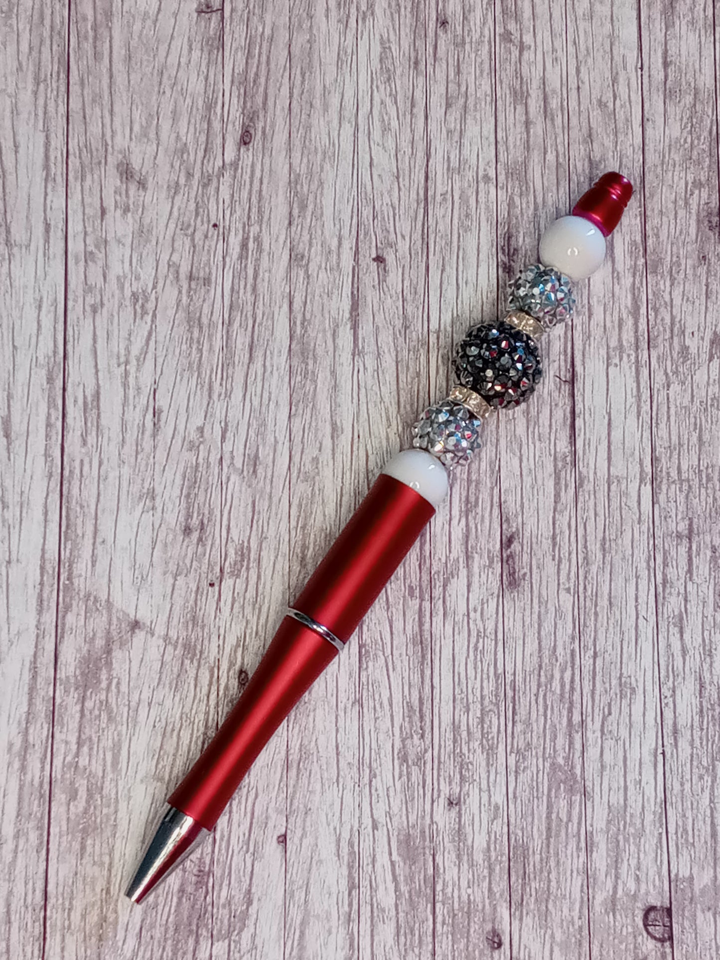 Silver and red beaded pen