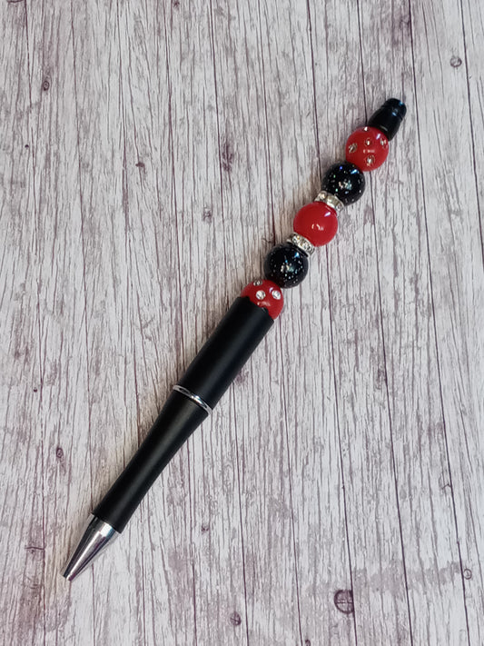 Black and red beaded pen