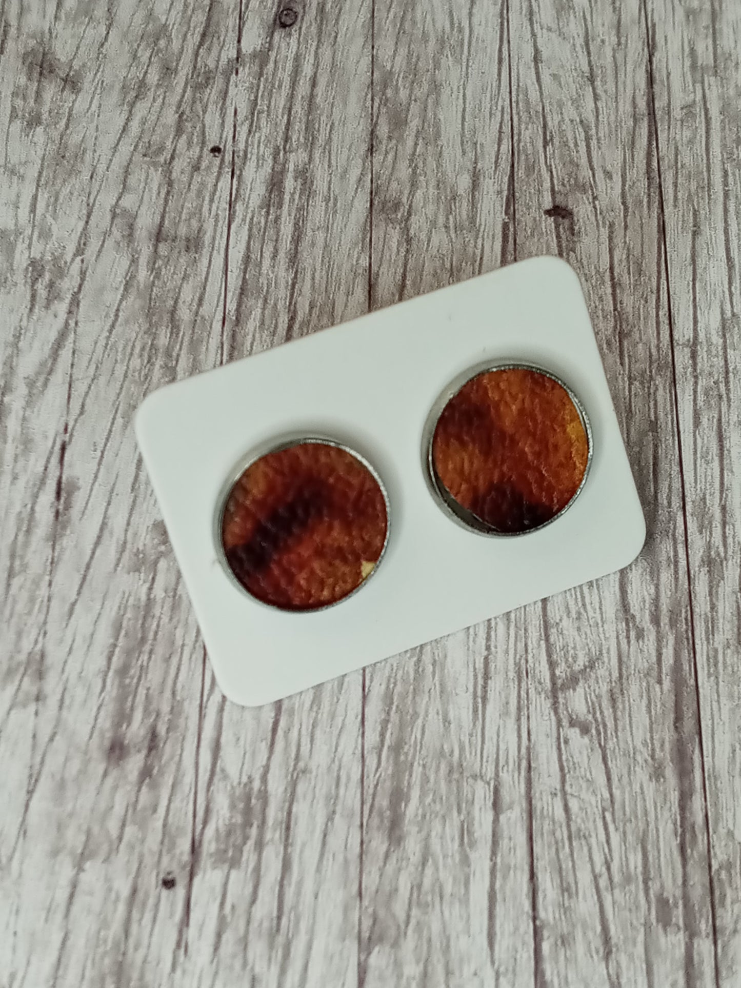 Faux leather stud earrings 12MM.