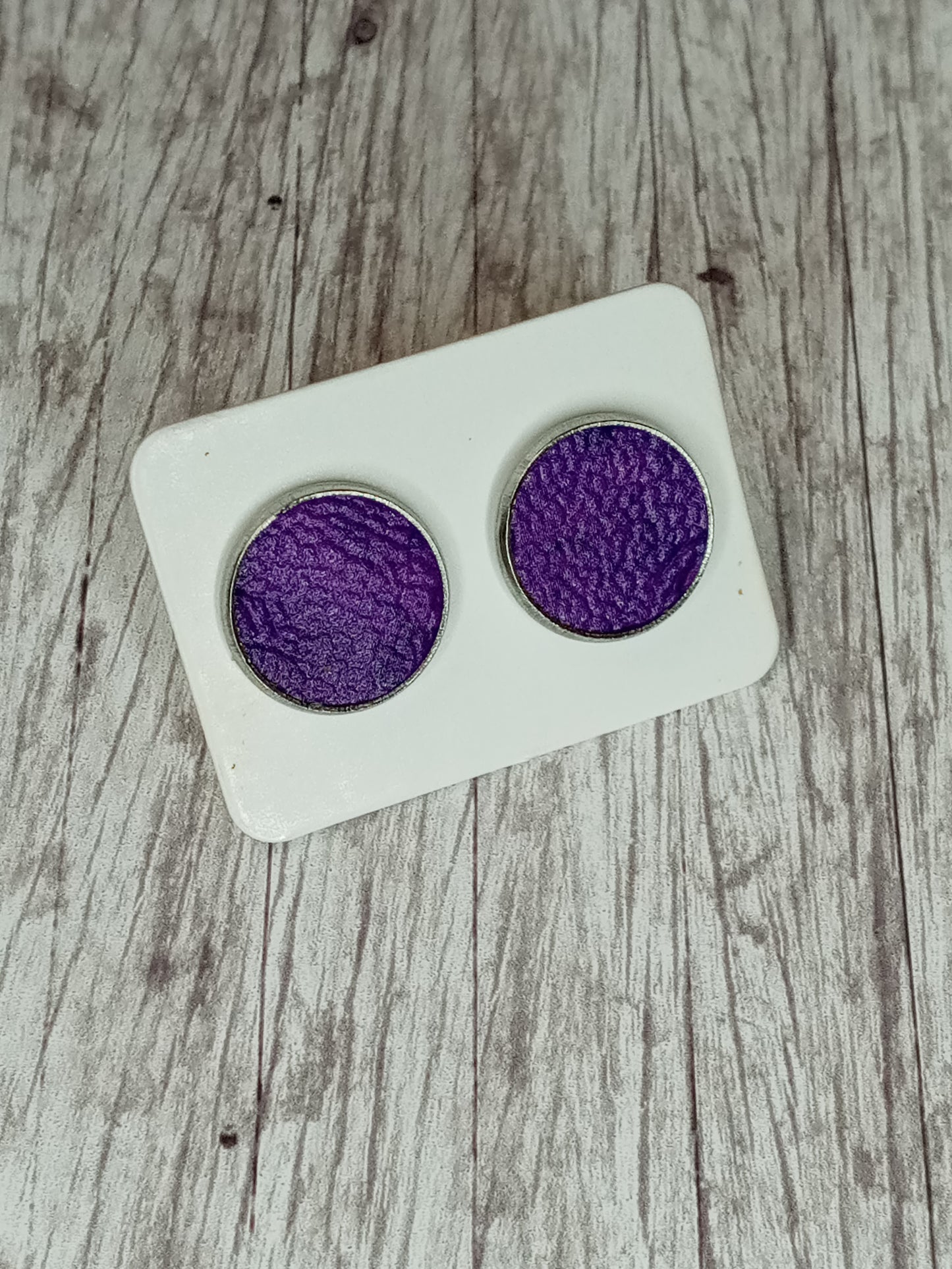 Faux leather stud earrings 12MM.