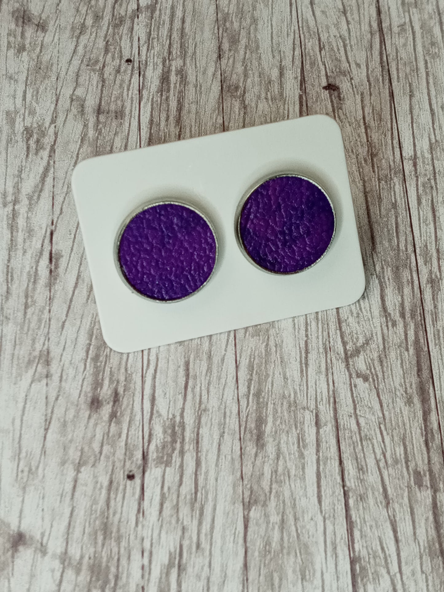 Faux leather stud earrings 12MM.