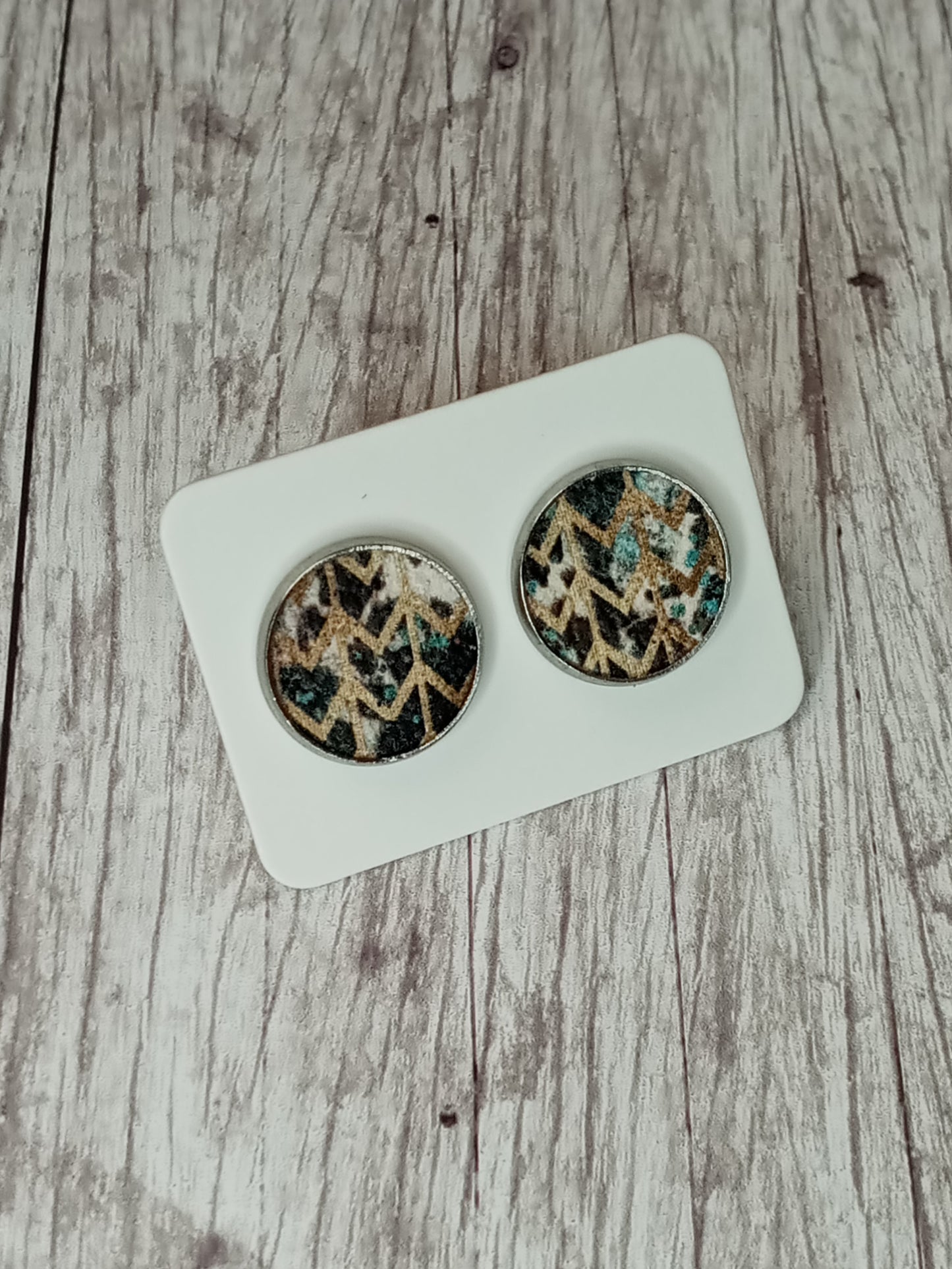 Faux leather stud earrings 12MM.