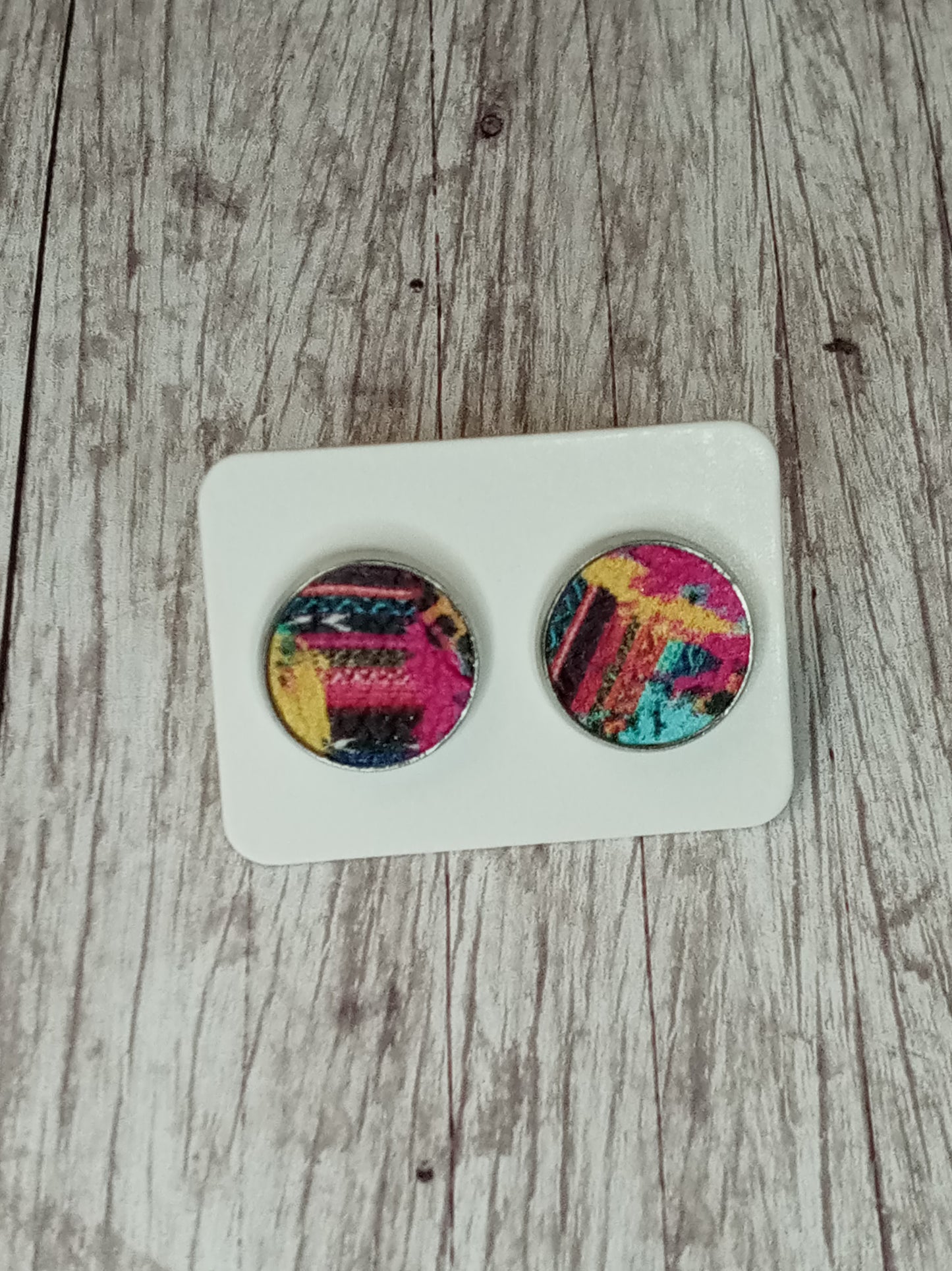 Faux leather stud earrings 12MM.