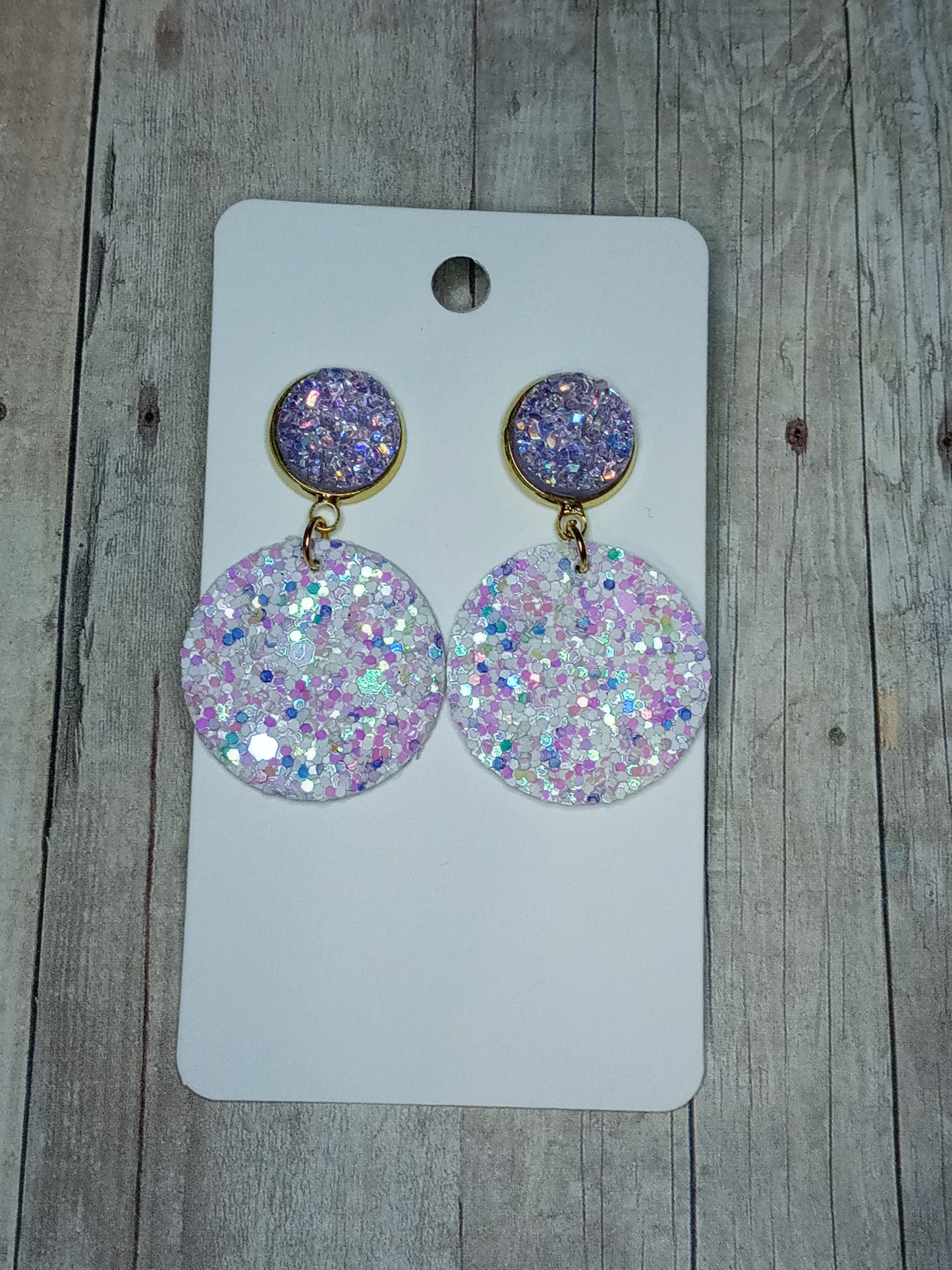 Light purple in gold setting and multi color white glitter circle earrings