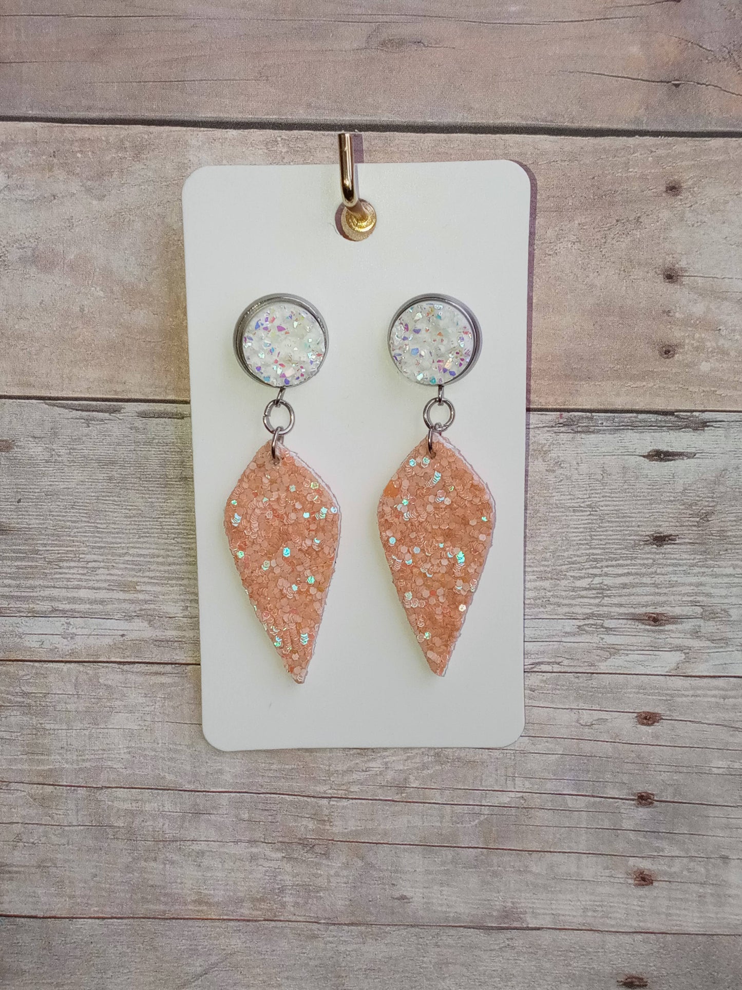 White druzy and peachy coral glitter dangle earrings