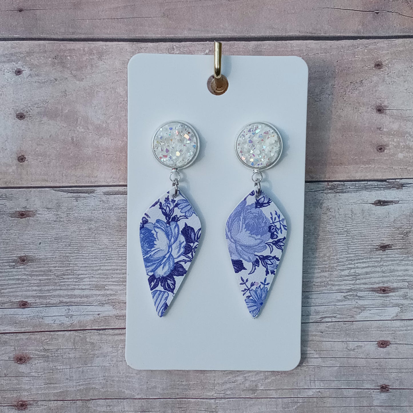 White glitzy druzy with blue/white floral dangle earrings