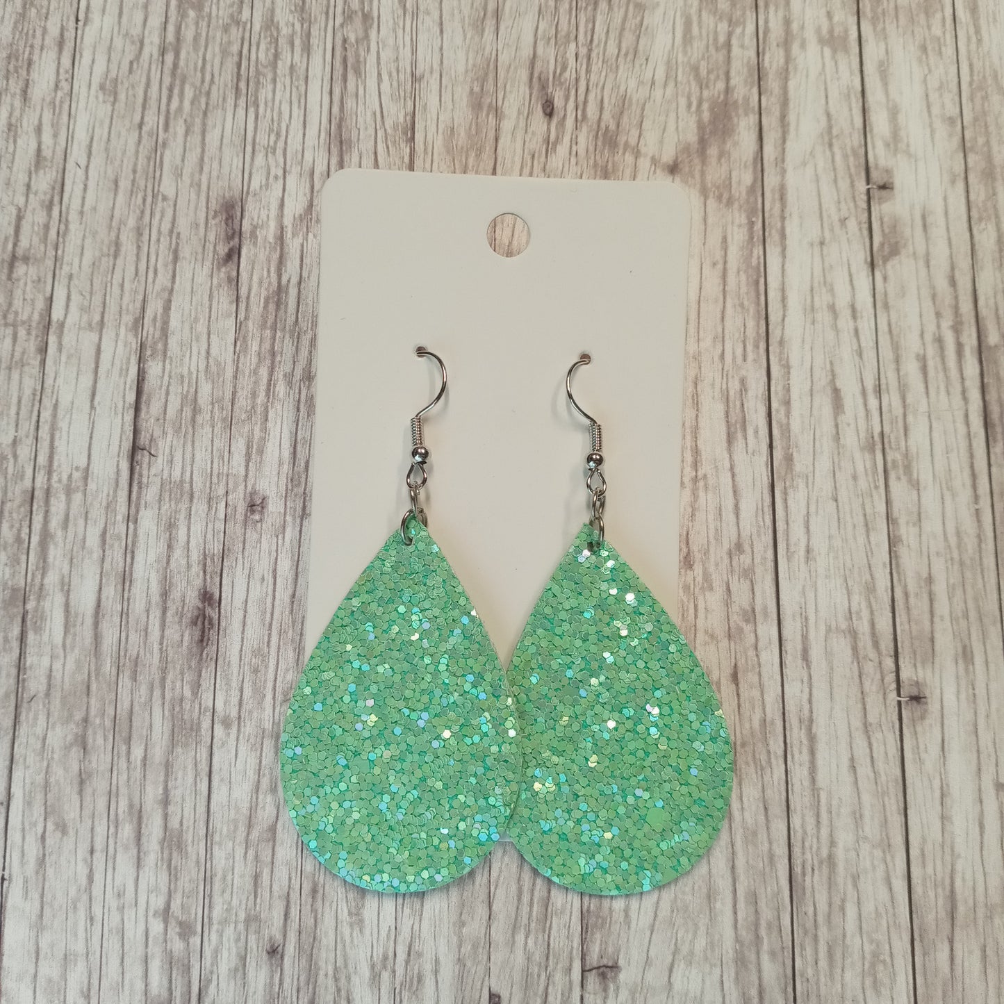 Light green glitter 2.25" dangly earrings