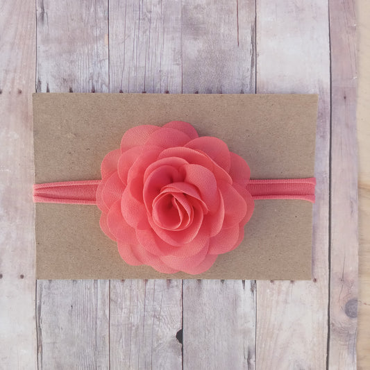 Coral flower on coral nylon headband