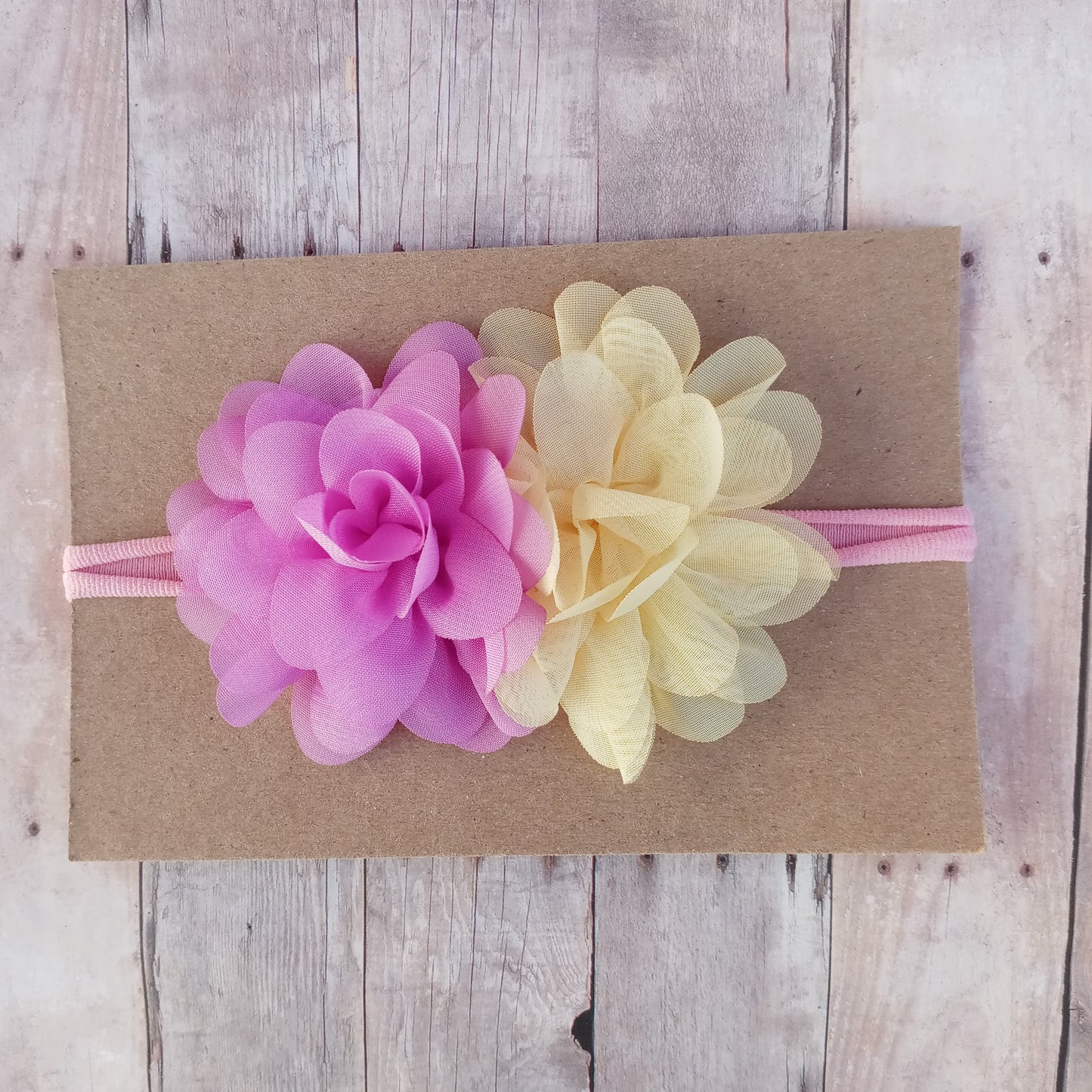 Purple and yellow double flower on pink nylon headband