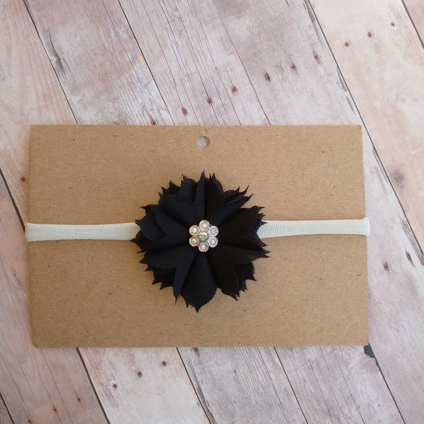 Black flower on grey nylon headband