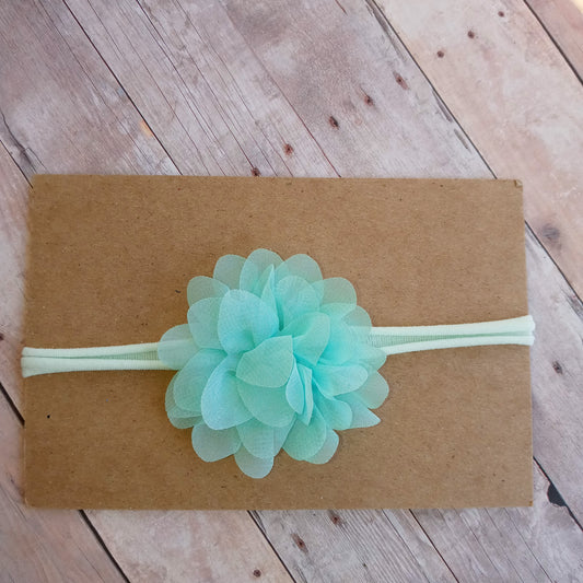 Light mint green flower on light mint nylon headband