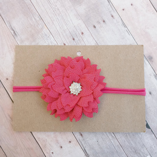 Pink flower on pink nylon headband