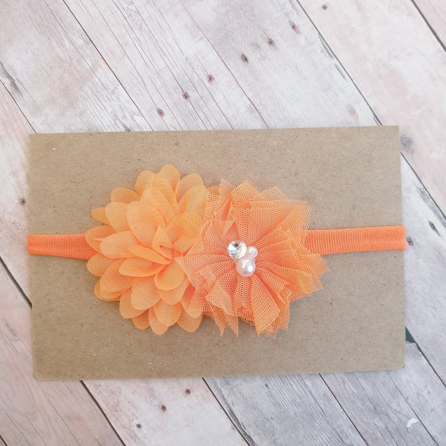 Orange flowers on orange nylon headband