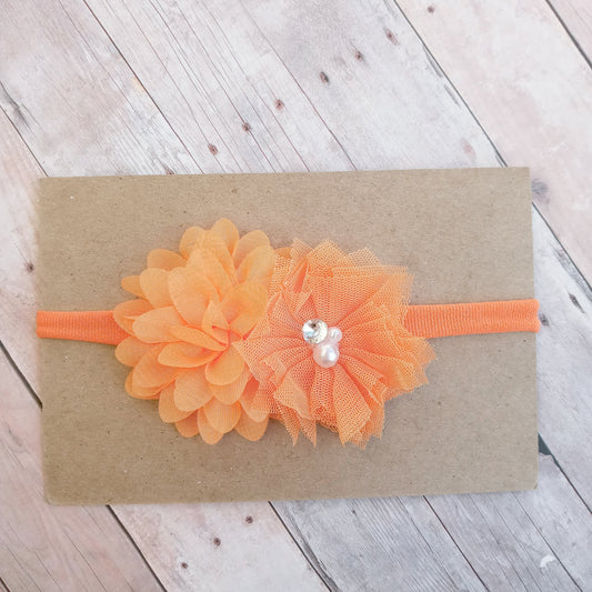 Orange flowers on orange nylon headband