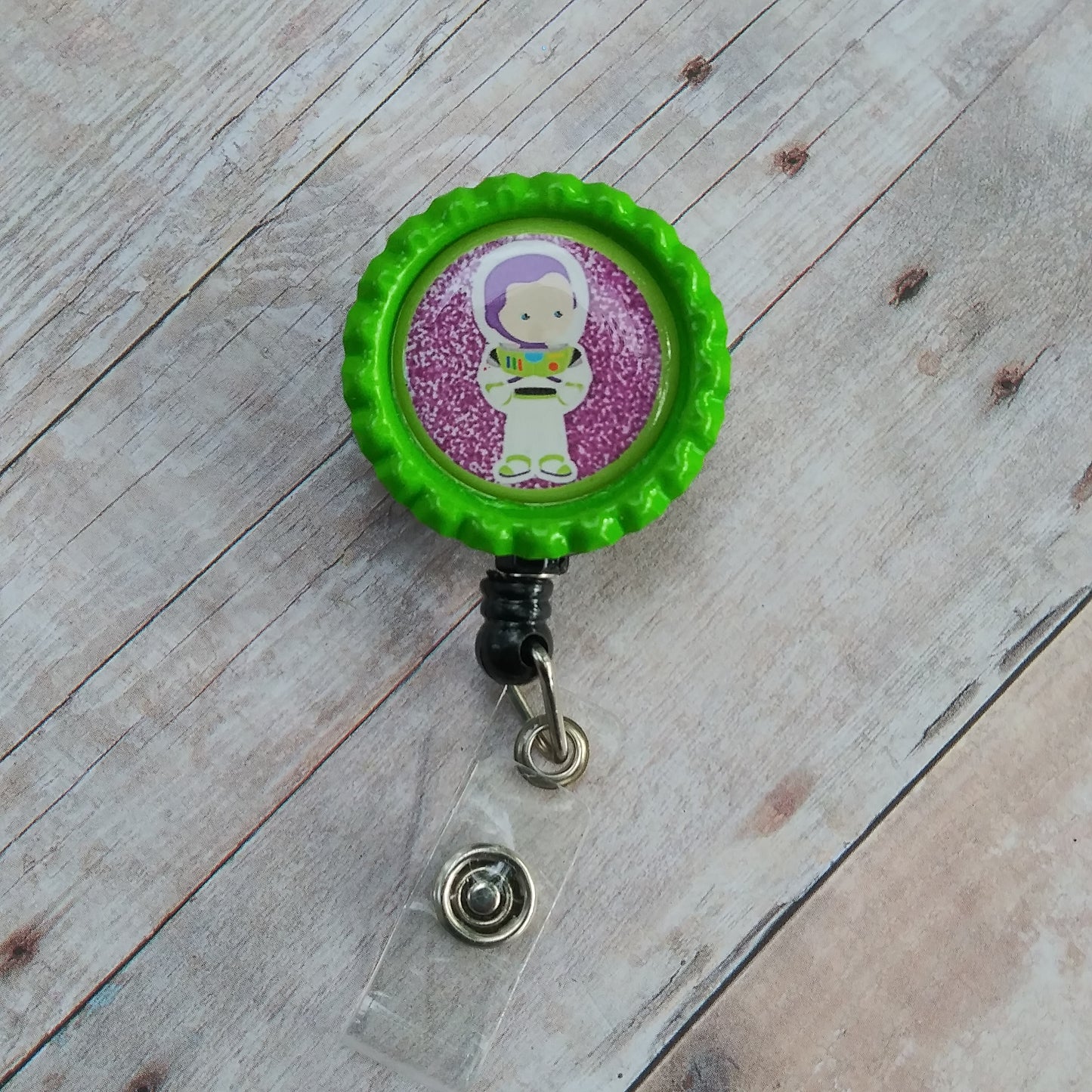 Green and Purple Astronaut Badge Reel