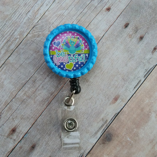 Be YOUtiful Peacock Badge Reel