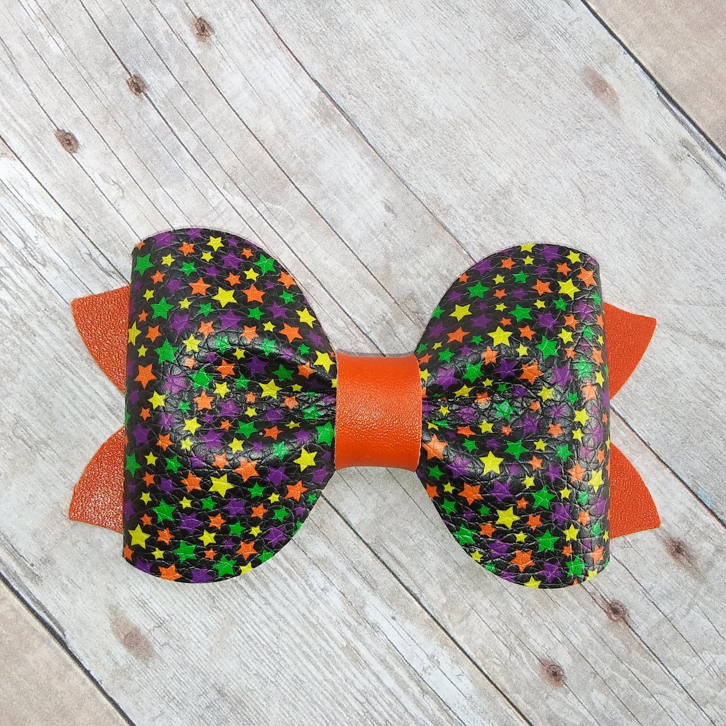 Orange, Purple, Green, and Yellow Stars 3.5" single layer pinch bow