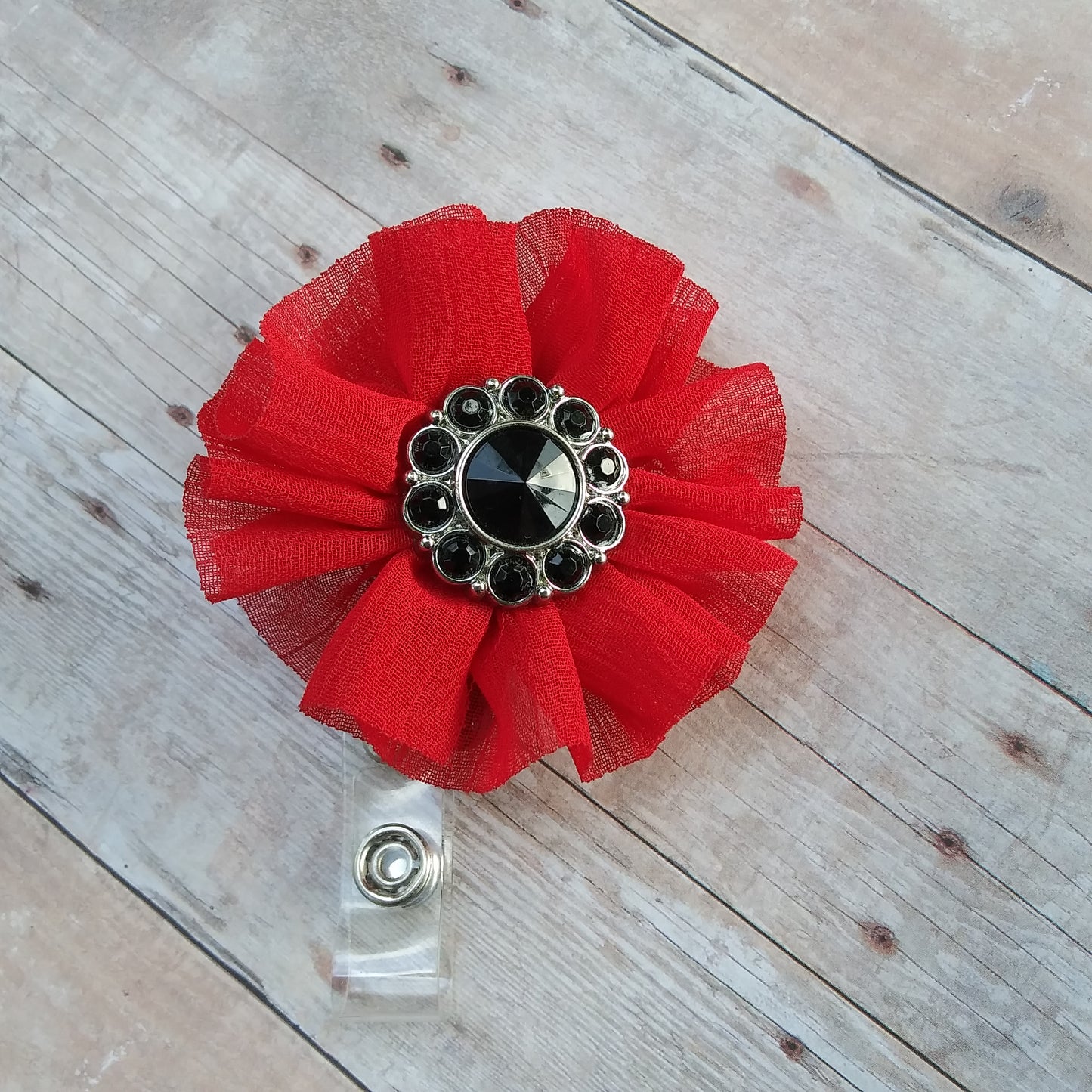 Red flower with Black Rhinestone Center Flower Badge Reel